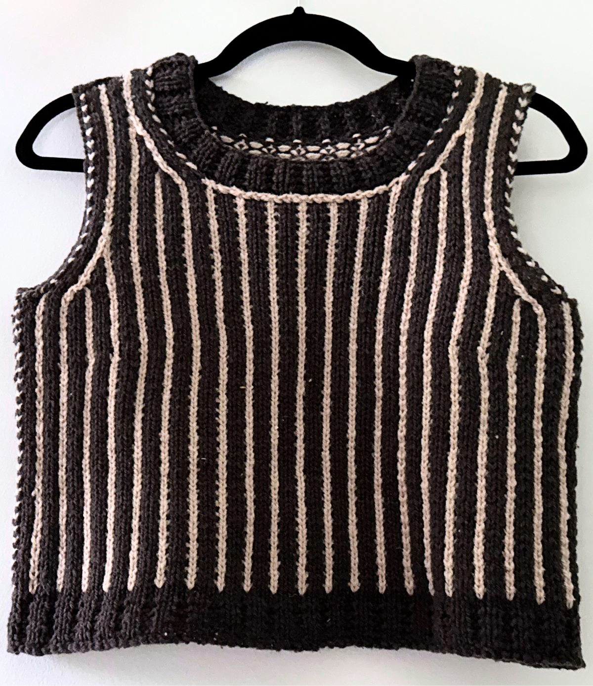 Knit sweater vest in charcoal grey and cream vertical stripes